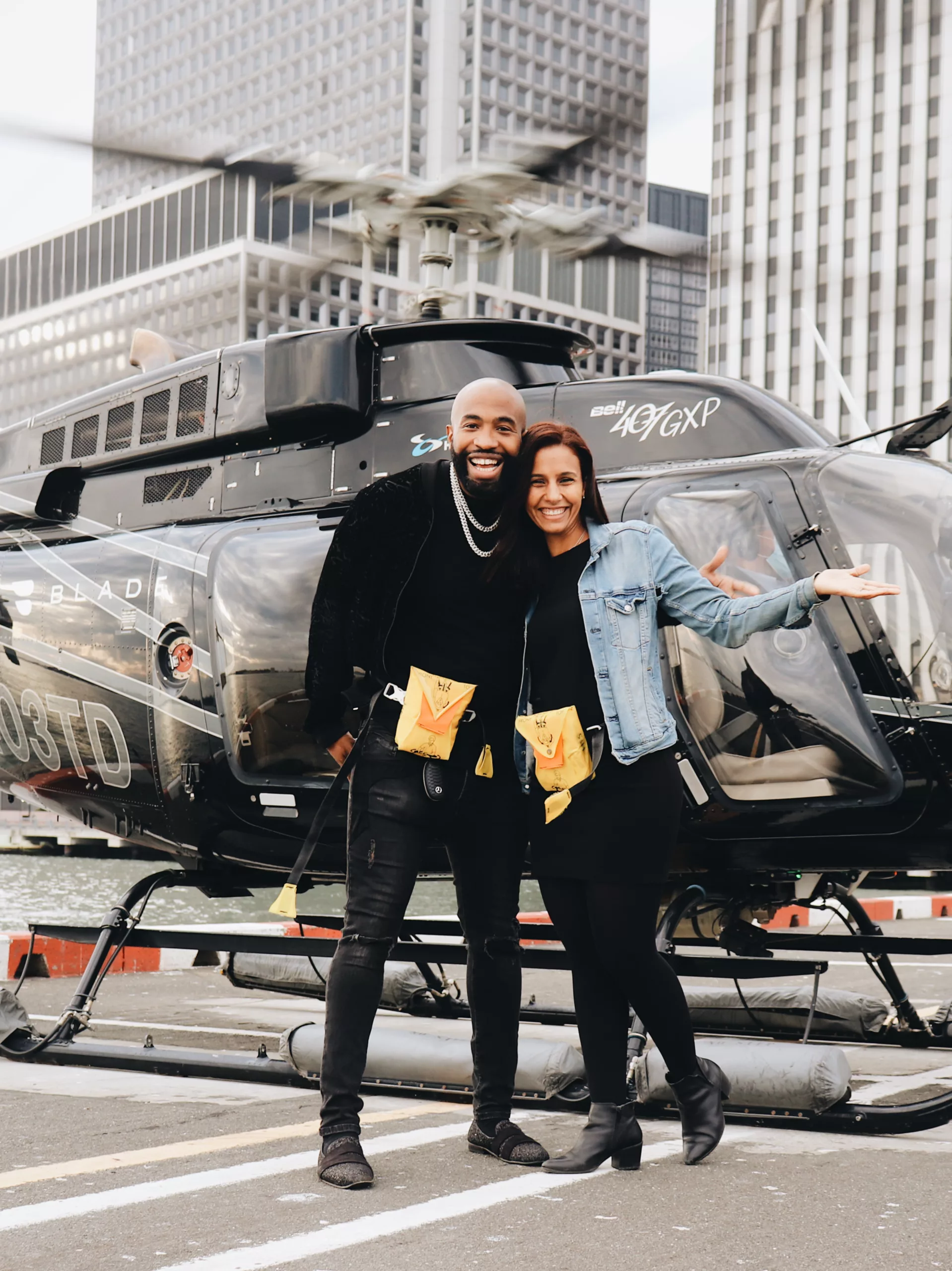 Couple in front of helicopter in Manhattan