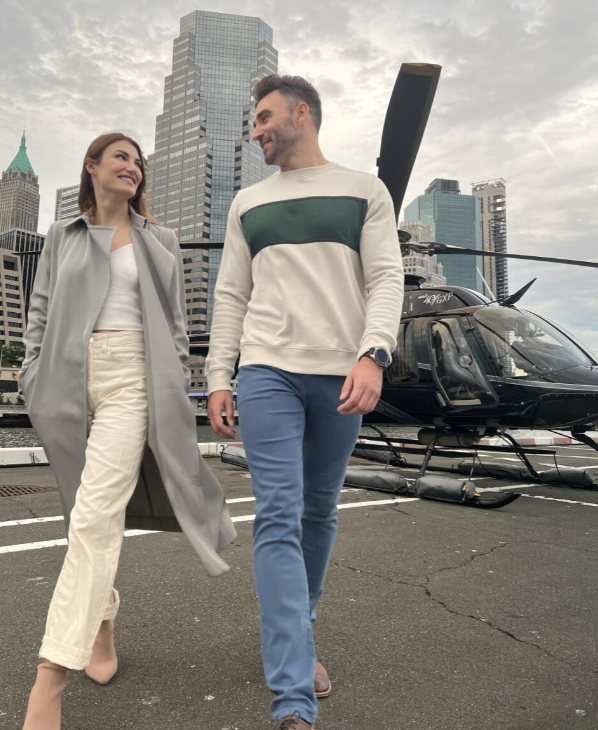Couple walking on helipad