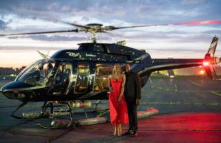 Couple - Luxury - boarding helicopter - HeliNY